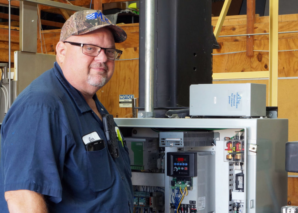 One of MTC's service team members servicing equipment